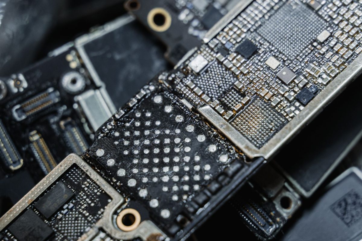 Macro shot of microchips and components on a circuit board