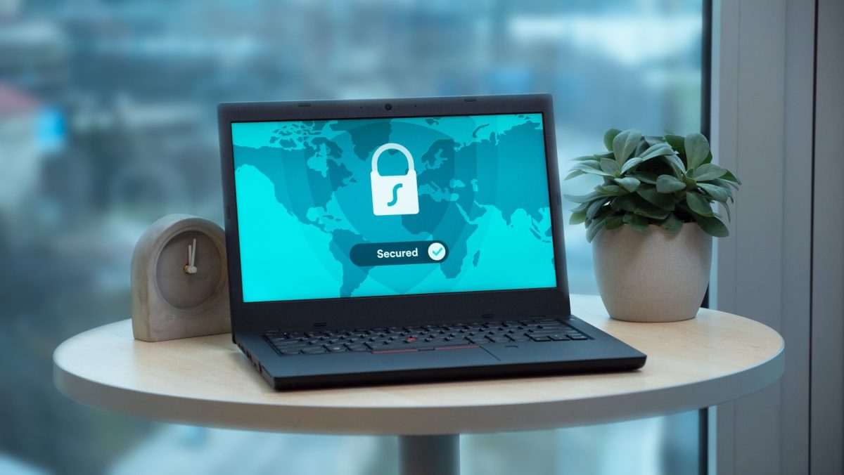 Laptop screen showing a padlock icon and a Secured status message